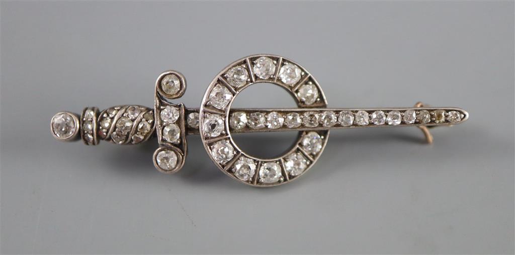 A 19th century gold, silver and diamond set dagger and sphere brooch,